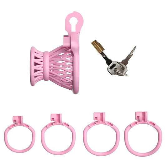Cage de chasteté négative Nyméa rose avec quatre anneaux, serrure et clés